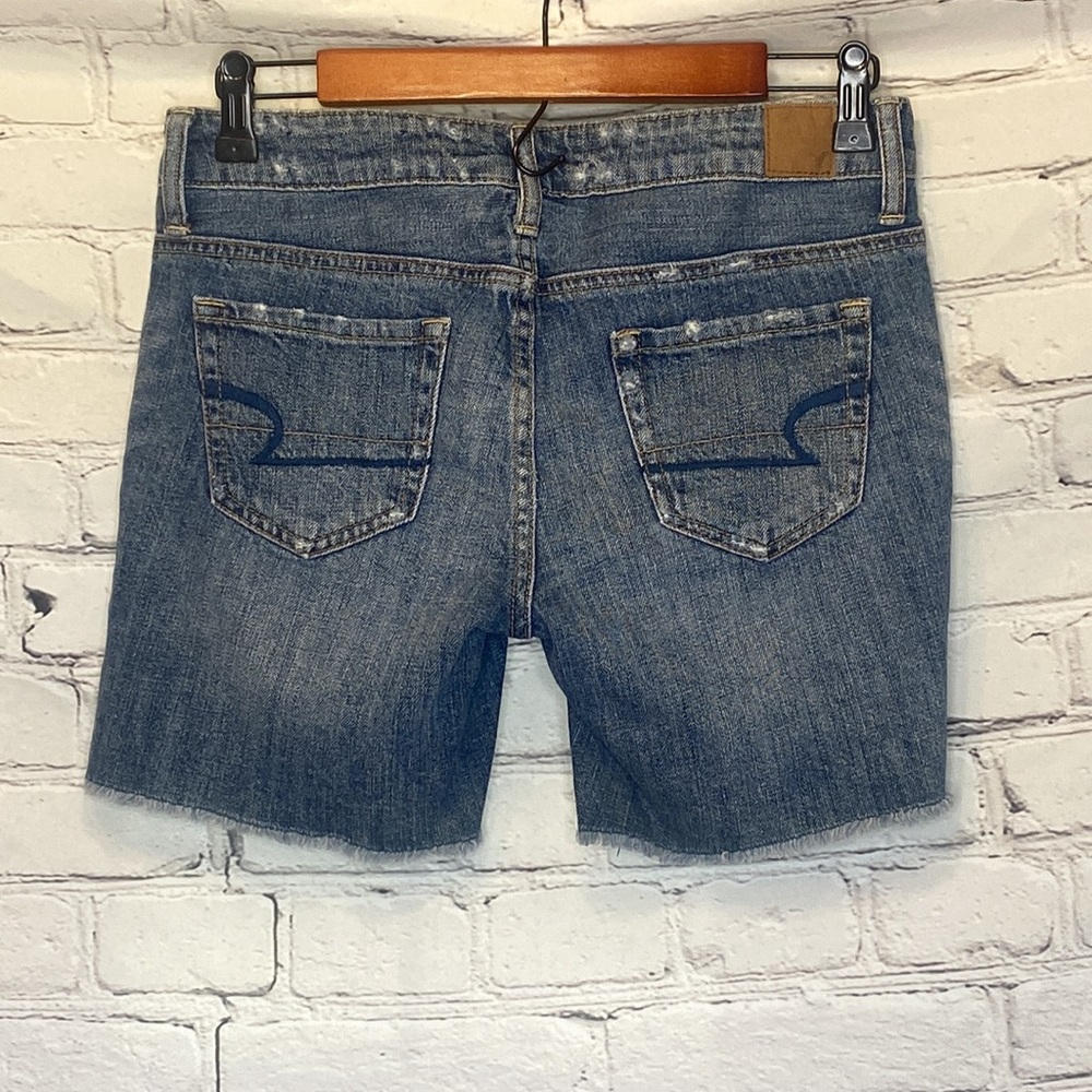 American Eagle Outfitters Cut-Off Distressed Blue Jean Shorts Size 0 - Picture 8 of 13